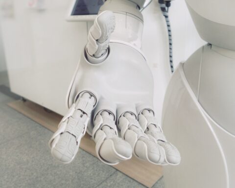 closeup photo of white robot arm